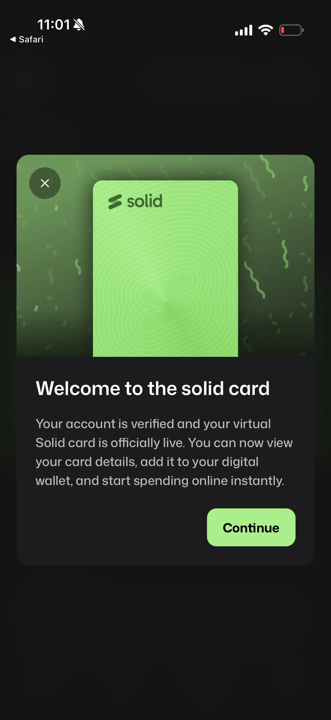 Solid app welcome modal showing the green Solid virtual card with confetti and the message Welcome to the solid card - your account is verified and your virtual Solid card is officially live