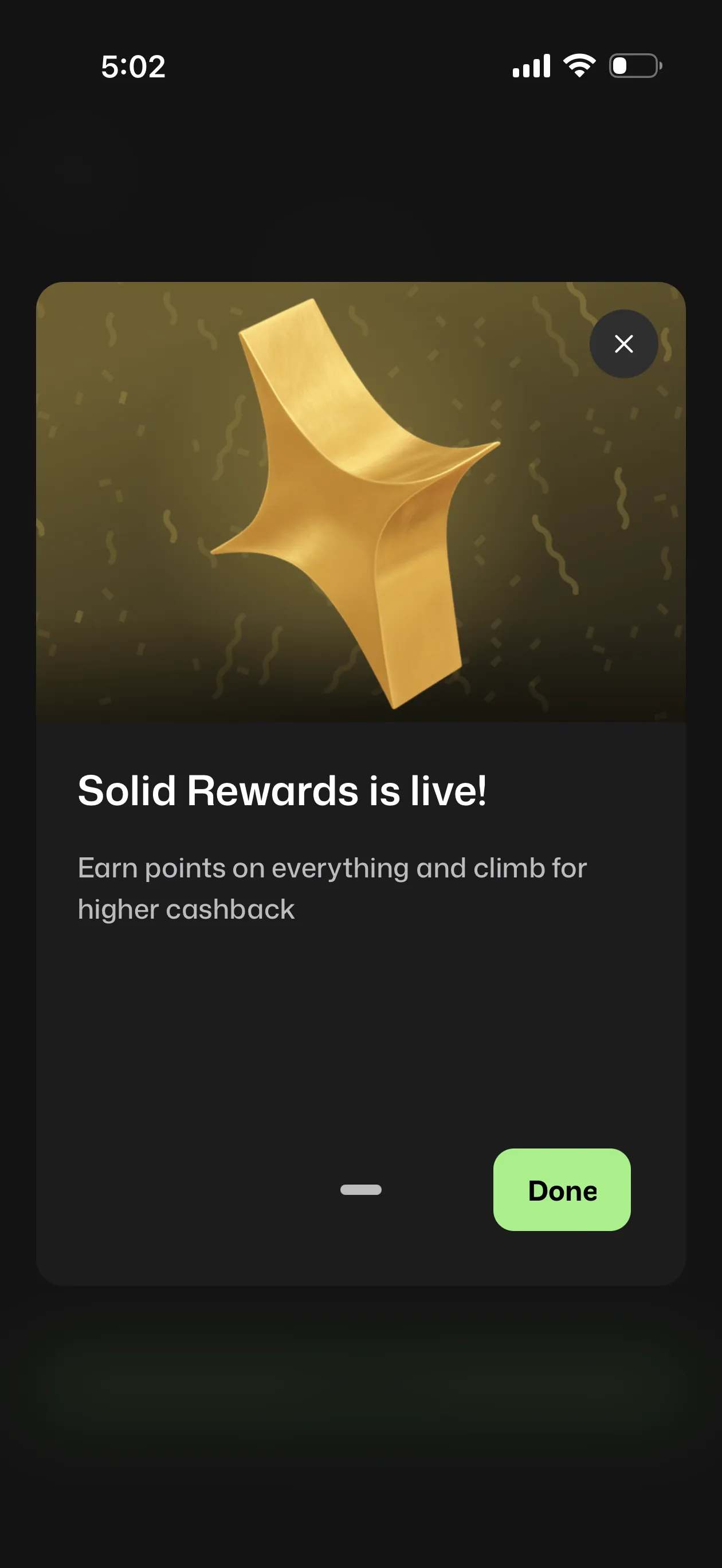 Solid app modal with a gold ribbon illustration announcing Solid Rewards is live - earn points on everything and climb for higher cashback